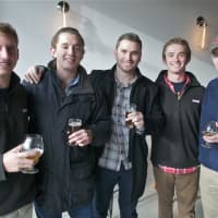 <p>A group of friends samples beer on opening day.</p>