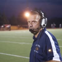 <p>Eastchester Head Coach Fred DiCarlo watches his team Friday at Harrison.</p>
