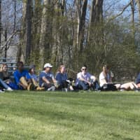 <p>Fans watch Wednesday&#x27;s game from the top of the hill at the Mahopac field.</p>