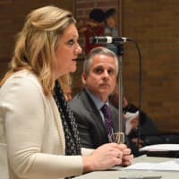 <p>Planner Brigette Bogart addresses the Emerson Land Use Board as Attorney Doug Doyle looks on.</p>