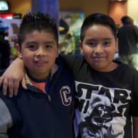 <p>Two pals get ready to see the movie.</p>