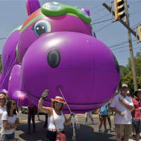 <p>Bridgeport residents line the streets Sunday to see the Barnum Festival&#x27;s Great Street Parade.</p>