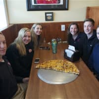 <p>A group of Kennedy Cathonic High students pizza at Froggy&#x27;s.</p>