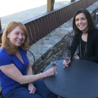 <p>Wine lovers enjoy a taste at Jones Family Farm Winery, which reopens this Saturday for spring.</p>