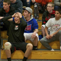 <p>A fan reacts to something he sees on the court.</p>