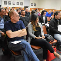 <p>A packed council chambers in Emerson Tuesday night during public comment on properties in the development area.</p>