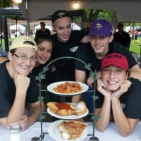 <p>The staff from Nick&#x27;s Restaurant &amp; Catering poses with a sampling of food at the Taste of Danbury food festival.</p>