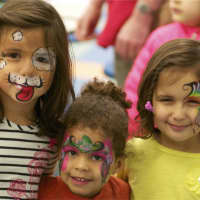 <p>Kids with painted faces.</p>
