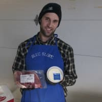 <p>Blue Slope Farm offered fresh meat at the Shelton Farmers Market on a recent Saturday.</p>