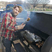 <p>Shelton&#x27;s Whitehill Smoke Eaters prepares brisket in a smoker outside of Saturday&#x27;s indoor farmers market.</p>