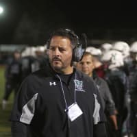 <p>Yorktown coach Mike Rescigno on the sidelines Saturday night.</p>