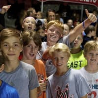 <p>Rye football fans cheer their team, as the Garnets pulled out a comeback win over Yorktown.</p>