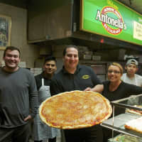 <p>Staff at Antonella&#x27;s with some of their popular pizza.</p>