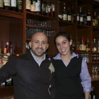 <p>Aroma Osteria Owner Alex Kovacs with Catherine Lugones.</p>