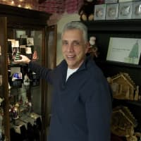 <p>Kringle&#x27;s owner Ron Iarossi with some of his specialty Christmas ornaments.</p>