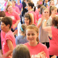 <p>Well-wishers for Christine Danza, most wearing &quot;I Shimmy for Chritsine&quot; T-shirts, pair up for a dance.</p>