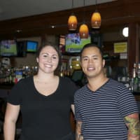<p>Handshakes&#x27; Brooke Formica with Faul Su, whose family owns and runs Handshakes Bar &amp; Grill.</p>