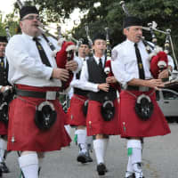 <p>Bagpipers from Clan Na Vale start the ceremony by escorting first responders to the 9/11 Memorial.</p>