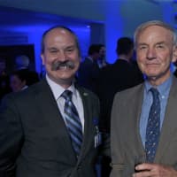 <p>Aquarium  marketing director Chris Loynd, left, of Stratford, and Red Apple Award winner Bill Burnham of New Canaan.</p>