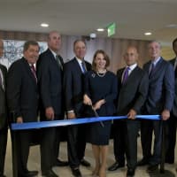 <p>City officials and dignitaries including Mayor Tom Roach (2nd from R), Susan Fox (with scissors), Kevin Plunkett (3rd from L), Steven Safyer (3rd from R) and Larry Smith (4th from L) at Monday&#x27;s ribbon cutting ceremony at White Plains Hospital.</p>