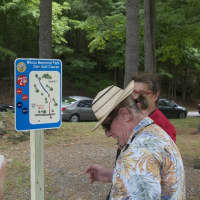 <p>Visitors check out a map of the new course.</p>