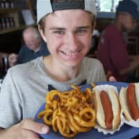 <p>A happy customer grabs lunch at Noshi&#x27;s in Poughkeepsie.</p>