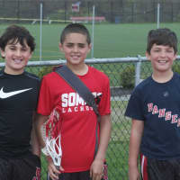 <p>Some potential future Tuskers stars watch the game between Bronxville and Somers.</p>