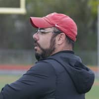 <p>Somers coach Vin DeGregorio watches the action.</p>