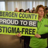 <p>Michele Hart-Loughlin of Old Tappan stands in support of Bergen County Executive Jim Tedesco&#x27;s impassioned defense to retain state funding for mental health services.</p>