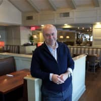 <p>Owner Frank Georgiou poses for a photo at the diner.</p>