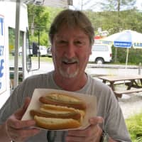 <p>A happy customer with two dogs from Forrest&#x27;s Sidestreet Cafe on the Pawling/Patterson line.</p>