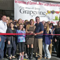 <p>Community members, family, the Carmel-Mahopac Chamber of Commerce, and Putnam County Executive Mary Ellen Odell (fourth from R) all came out Saturday to show some love for Grapevine of Carmel Fine Wines and Spirits.</p>