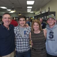 <p>Owners Danny and Jennifer Dougherty with sons Matt and Ryan (far R).</p>