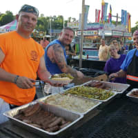 <p>The men serving up all that great food at the Mahopac Volunteer Fire Department carnival.</p>