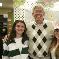 <p>Retired XC and track coach Sean Ryan (center) with track and XC standouts Caroline Pennacchio (L) and Molly Rickles.</p>