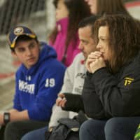 <p>Fans watch the action on the ice Friday at Brewster.</p>