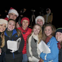<p>Carolers from Carmel High School performed at Saturday&#x27;s holiday celebration.</p>