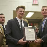 <p>Mahopac&#x27;s Cullen Malzo (L) was honored by local and state officials Wednesday night at Carmel Town Hall.</p>