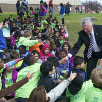 <p>Mayor Harry Rilling greets school kids at Friday&#x27;s ceremony.</p>