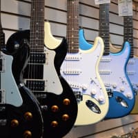 <p>Guitars for sale at Gus Baxter&#x27;s Park Ridge shop.</p>