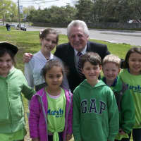 <p>Mayor Harry Rilling poses with poster contest winners from Marvin Elementary School.</p>