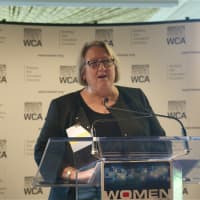 <p>Honoree Dr. Joan Fallon speaks at the Women in Tech award luncheon.</p>