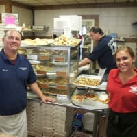 <p>Manager Patsy Femia and Jennie Pagliuca behind the counter at Cacciatori Pizza.</p>