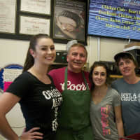 <p>Owner Jim Reynolds (second from L) and some of the staff at Mountaintop Market.</p>
