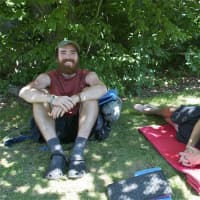 <p>Nicknamed Songbird (L) and Foot (R) for the duration of their Adirondack Trail journey, the hikers take a break for food, drink and rest at Mountaintop Market.</p>