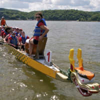 <p>The Marist Fire Foxes team heads for the dock after finishing a race.</p>