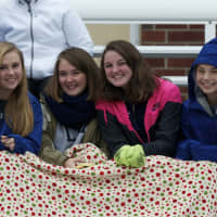 <p>Fans stay warm at Saturday&#x27;s soccer game at Carmel.</p>