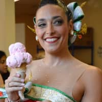 <p>Upper Saddle River Rockette Nicole Baker Luftig took a taste of her peppermint stick ice cream cone.</p>
