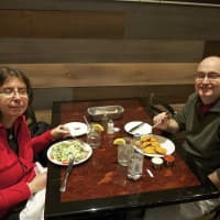 <p>A couple enjoys a meal at Sauro&#x27;s Town Square Pizza Cafe.</p>