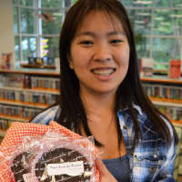 <p>Lauren Lee in the children&#x27;s room at the Haworth Municipal Library with some of the home-baked treats she&#x27;s been donating there for years.</p>